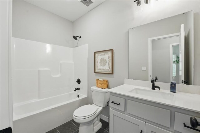1024 Branchwood Ln, Raymore, MO 64083 - bathroom featuring vanity, tile patterned flooring, and tub / shower combination