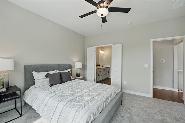1024 Branchwood Ln, Raymore, MO 64083 - bedroom with carpet flooring, ceiling fan, and ensuite bath