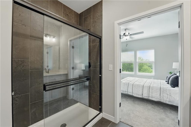 1024 Branchwood Ln, Raymore, MO 64083 - ensuite bathroom with ceiling fan and a shower stall