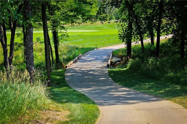 1024 Branchwood Ln, Raymore, MO 64083 - view of community with golf course view and view of scattered trees