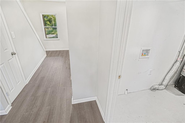 112 W Pine St, Drexel, MO 64742 - corridor featuring wood finished floors and baseboards