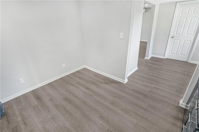 empty room with wood-type flooring