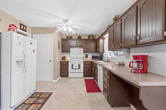 kitchen with backsplash, ceiling fan, sink, and white appliances