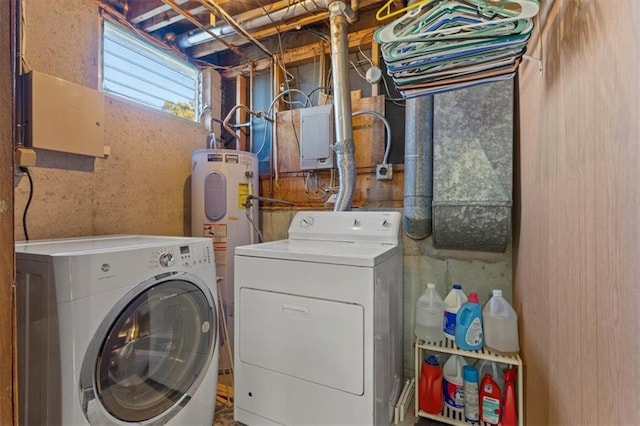 clothes washing area with washing machine and dryer