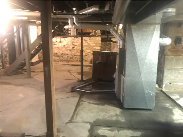 basement featuring heating unit