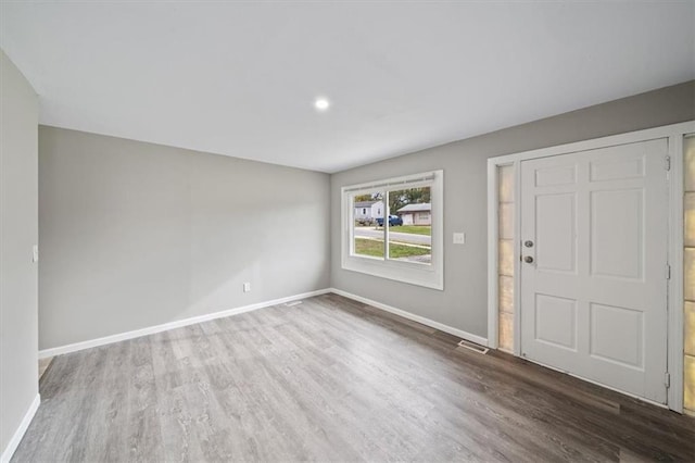 foyer with hardwood / wood-style floors