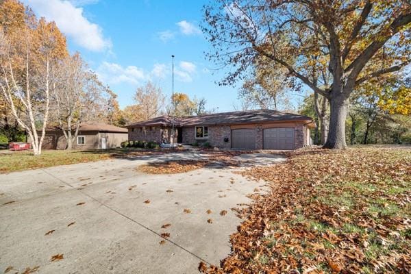 single story home with a garage