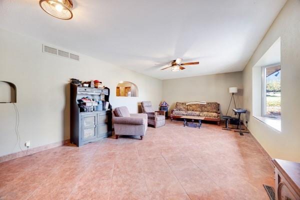 living room with ceiling fan