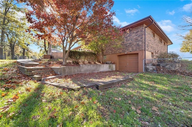 view of yard featuring a garage