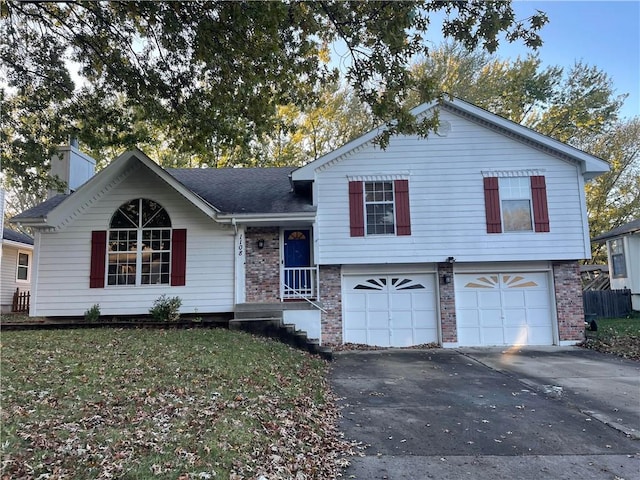 split level home featuring a garage