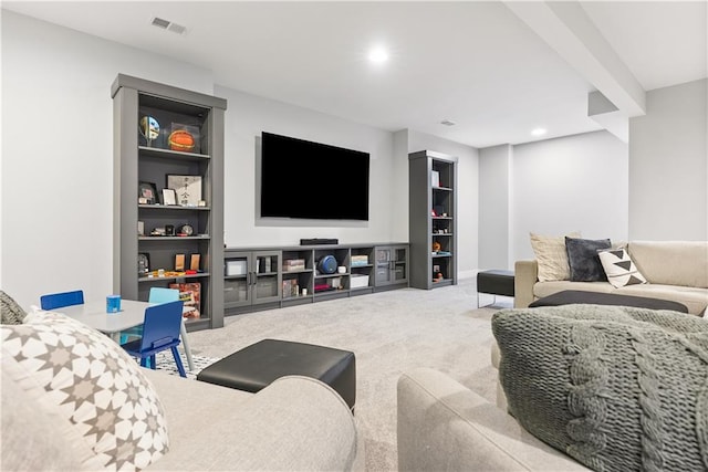 living room featuring built in features and carpet floors