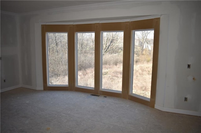 interior space with crown molding