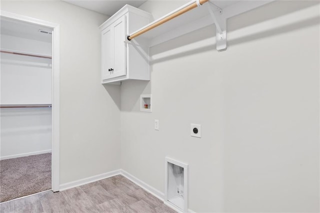 laundry room featuring visible vents, baseboards, cabinet space, electric dryer hookup, and washer hookup