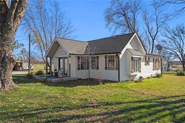 view of home's exterior featuring a yard