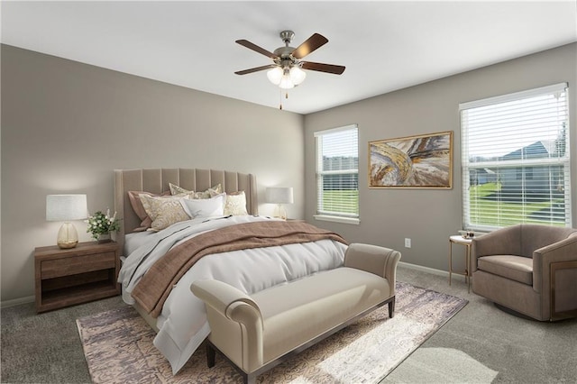 bedroom with dark colored carpet and ceiling fan