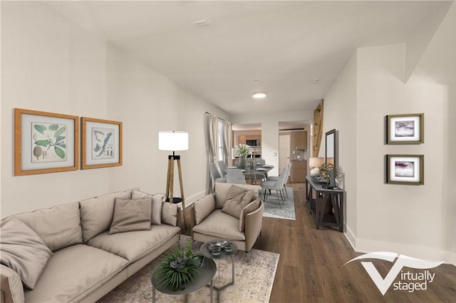 living room with dark hardwood / wood-style flooring