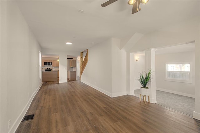 hallway with dark wood-type flooring