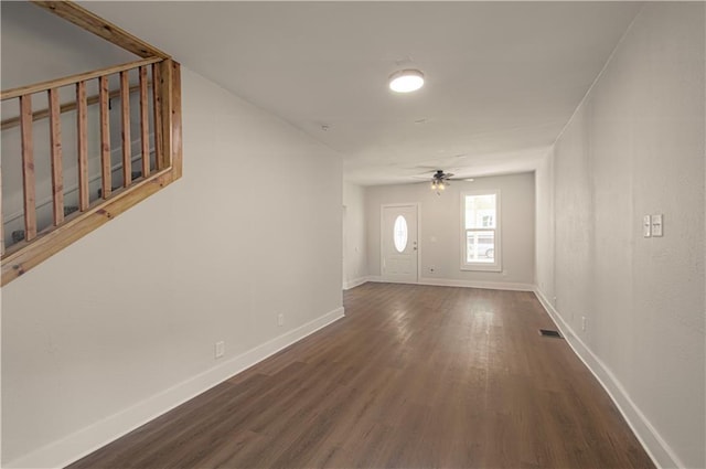 entrance foyer with ceiling fan and dark hardwood / wood-style flooring