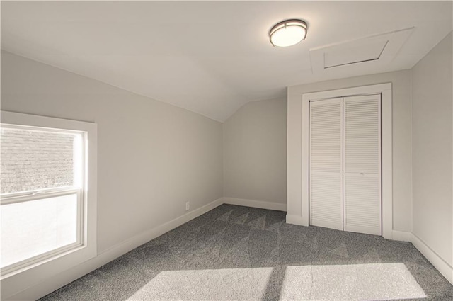 bonus room featuring carpet and vaulted ceiling