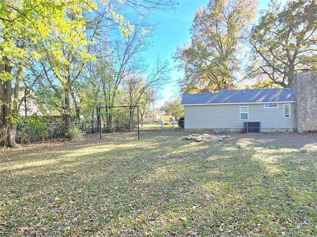 view of yard featuring central AC