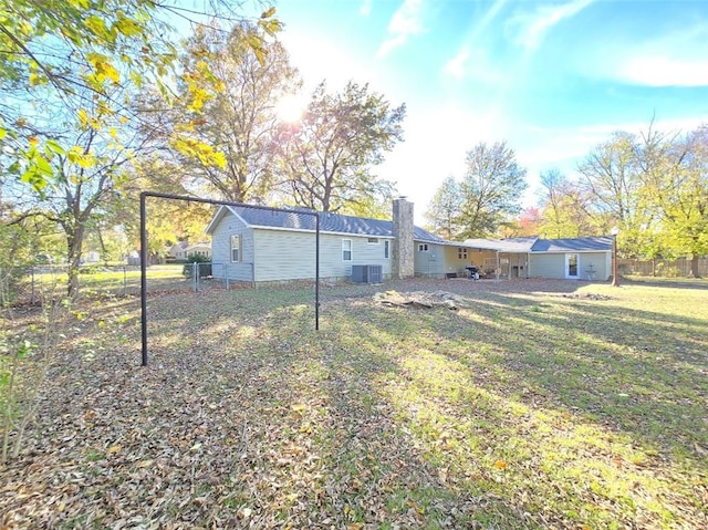 view of yard featuring central AC