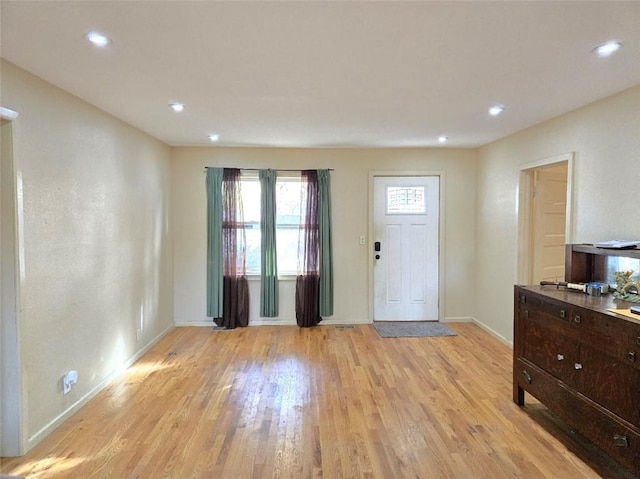 entryway with light hardwood / wood-style flooring