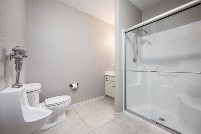 bathroom featuring vanity, a bidet, tile patterned flooring, and an enclosed shower