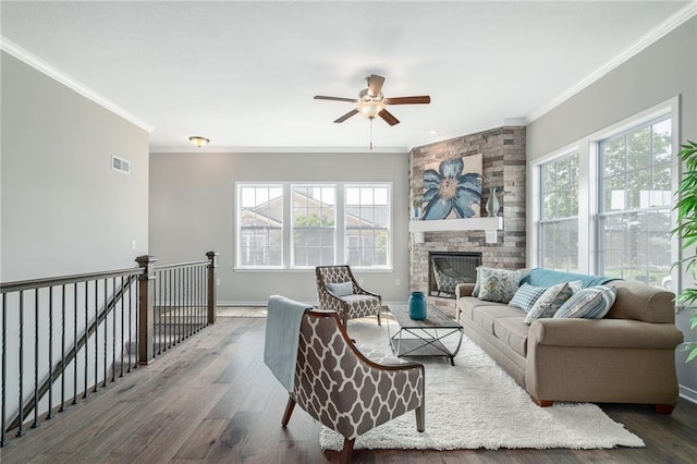 11901 S Tallgrass Dr Unit 702, Olathe, KS 66061 - living area with ornamental molding, wood finished floors, ceiling fan, baseboards, and a fireplace
