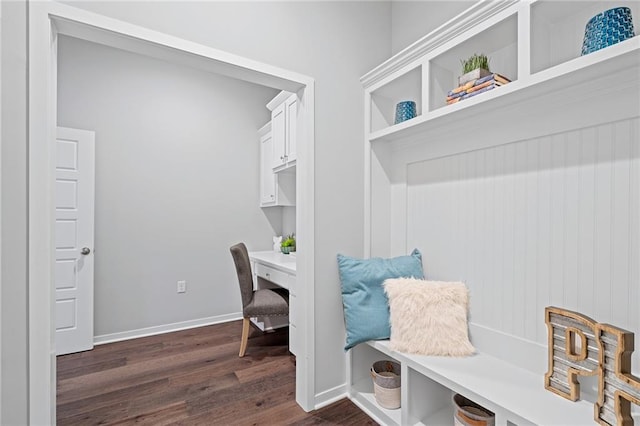 11901 S Tallgrass Dr Unit 702, Olathe, KS 66061 - mudroom with dark wood-style flooring, built in desk, and baseboards