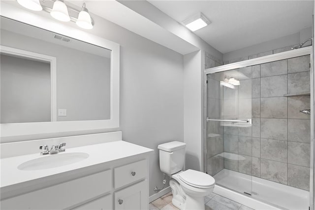 11901 S Tallgrass Dr Unit 702, Olathe, KS 66061 - full bathroom with a shower stall, toilet, vanity, and baseboards