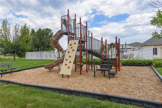 view of play area with a yard