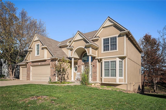 view of front of home featuring a garage and a front lawn