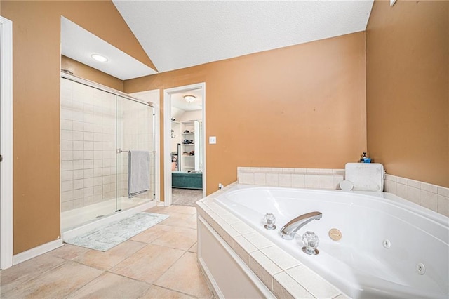 bathroom with tile patterned floors, a textured ceiling, independent shower and bath, and vaulted ceiling