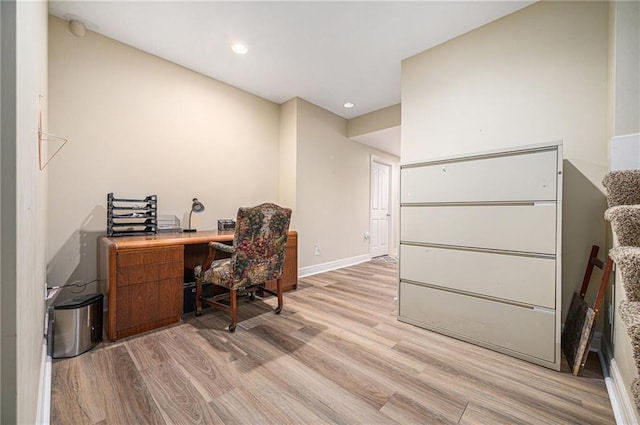 office space with light hardwood / wood-style flooring