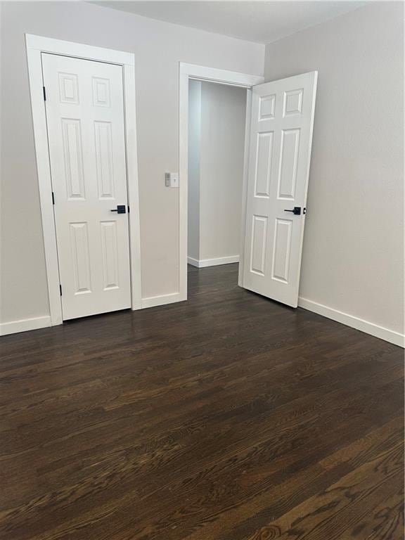 interior space with dark hardwood / wood-style floors