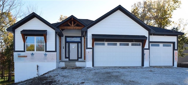 view of front of property featuring a garage