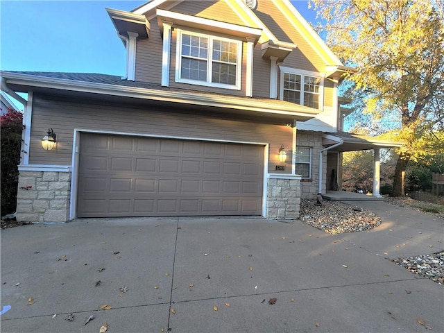 view of front of property featuring a garage