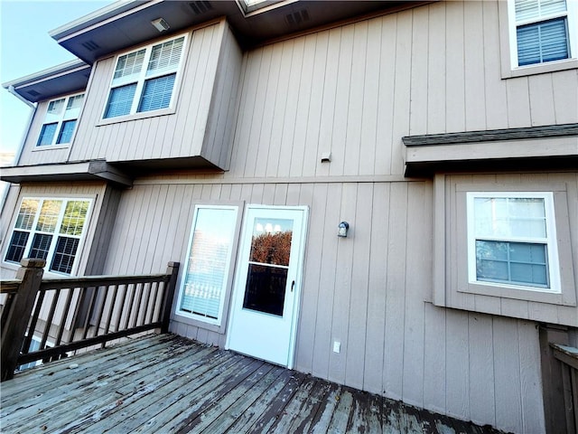 doorway to property featuring a deck