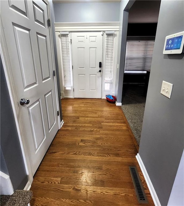 hall featuring dark hardwood / wood-style flooring