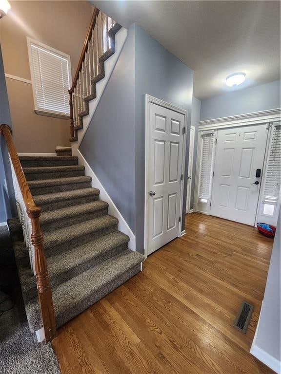 entrance foyer with hardwood / wood-style flooring