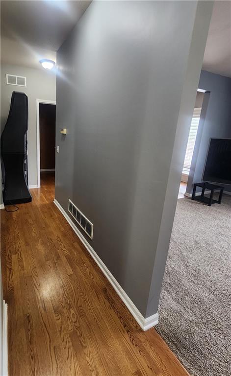 hall featuring hardwood / wood-style floors