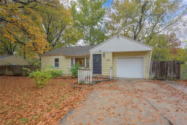 single story home with a garage