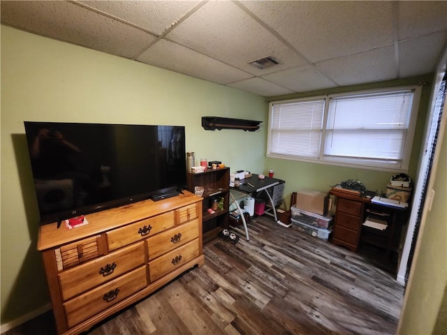 2716 N 10th St, Independence, KS 67301 - office space featuring a drop ceiling and dark wood-style flooring