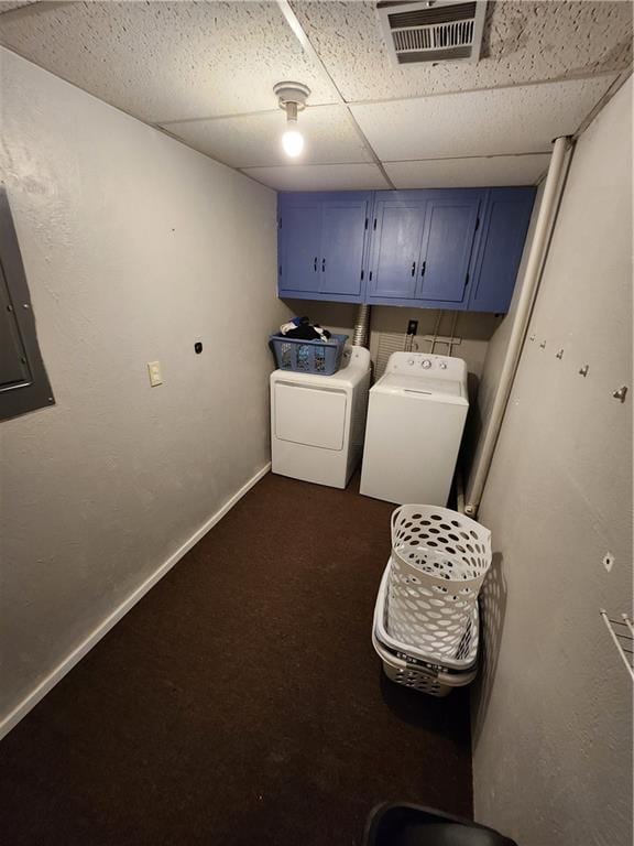 laundry room featuring washer and clothes dryer, cabinets, and dark carpet