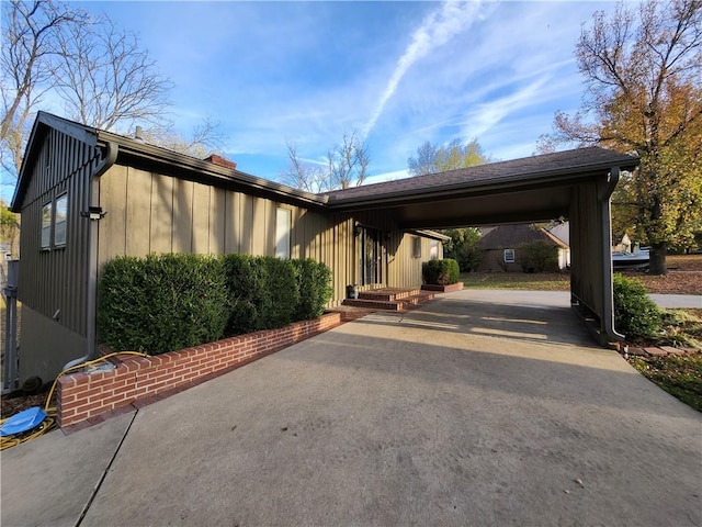 exterior space with a carport