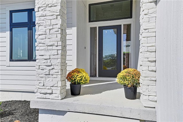 24912 W 98th Pl, Lenexa, KS 66227 - doorway to property featuring stone siding