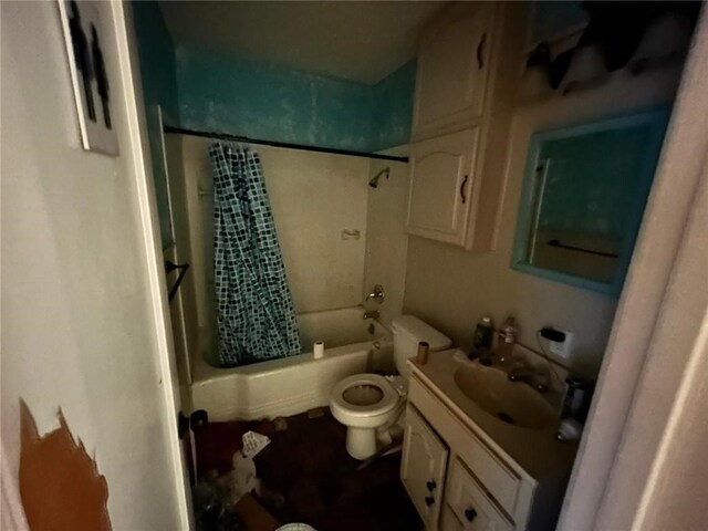 full bathroom with toilet, shower / tub combo, and vanity