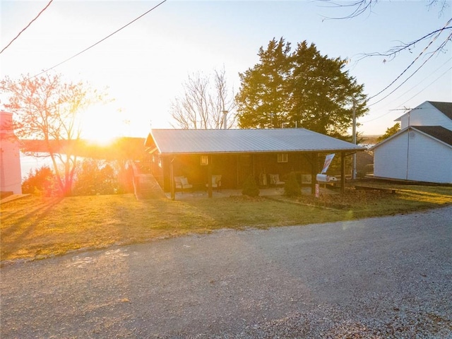 view of front of house featuring a carport