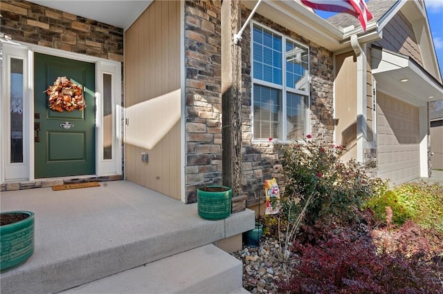 entrance to property featuring a garage