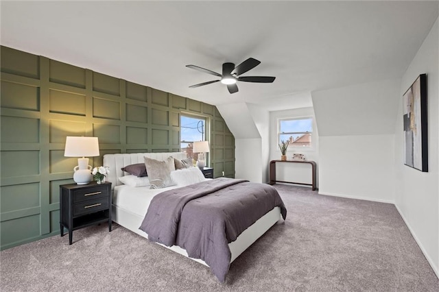 bedroom with carpet flooring, ceiling fan, and lofted ceiling